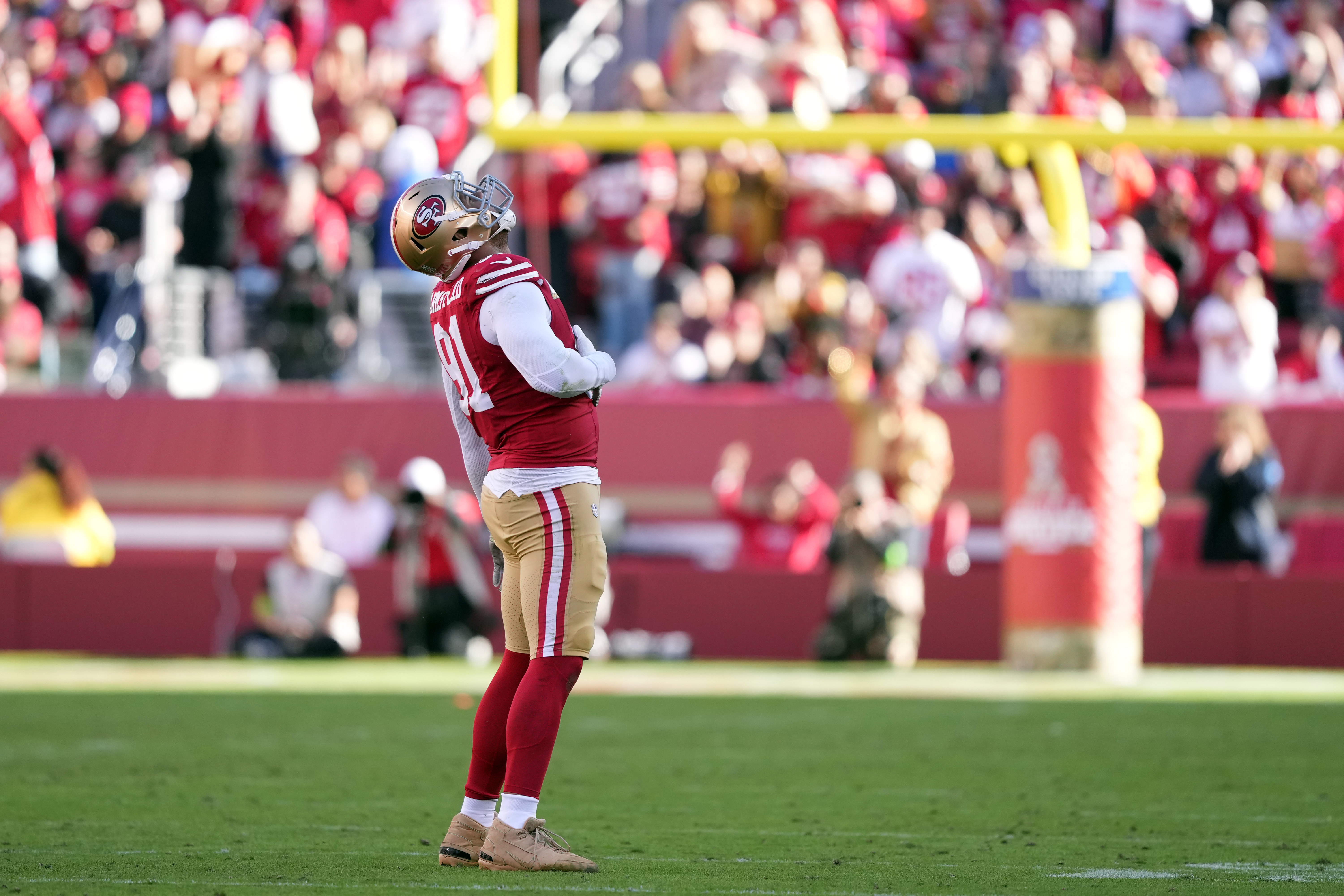  49ers defensive end Arik Armstead (91) gestures after recording a sack against the Tampa Bay Buccaneers during the second quarter at Levi's Stadium.